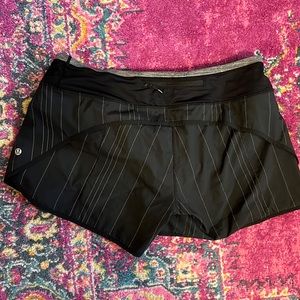 Lululemon 4” shorts with reflective stripes